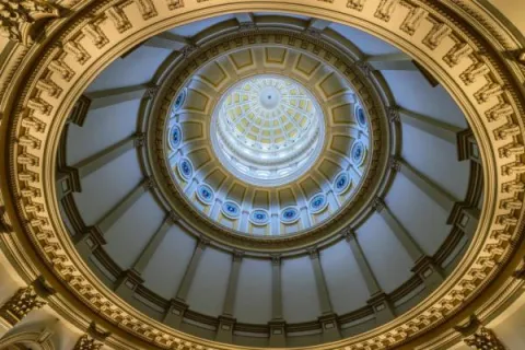 Capitol rotunda with gold in the foreground